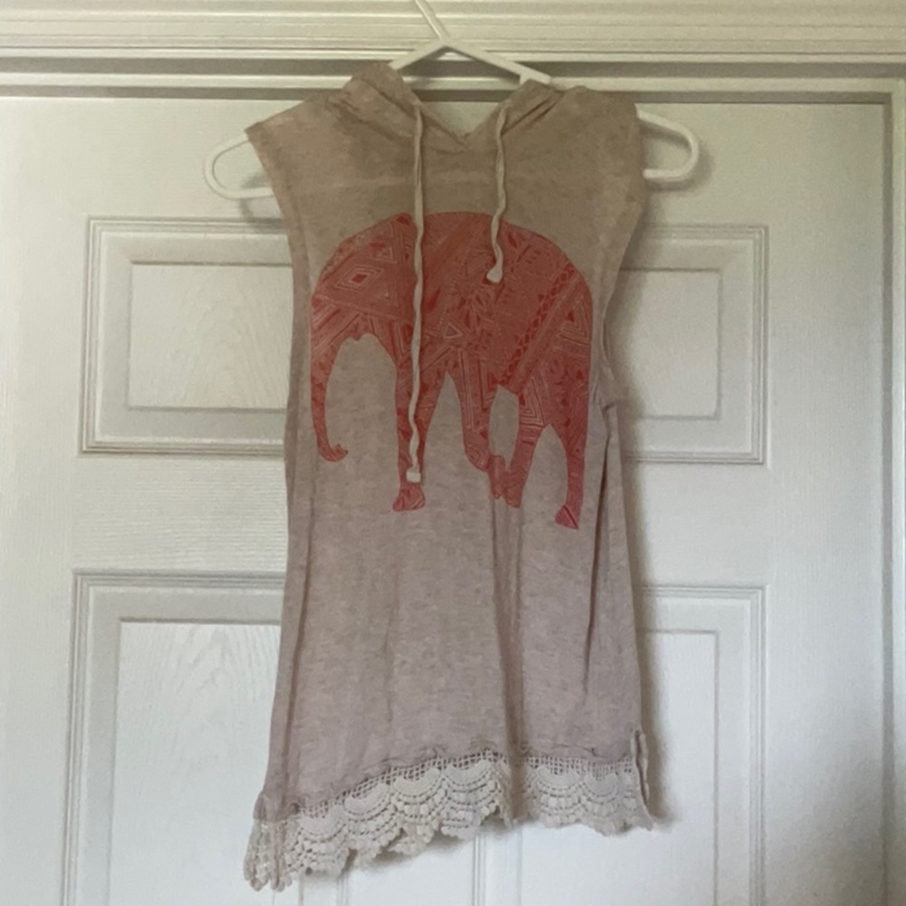 Small shirt with orange elephant on the front